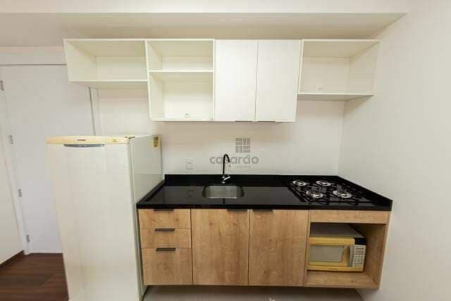 85dc6e-studio-1-quarto-no-pelotas-cozinha.jpg