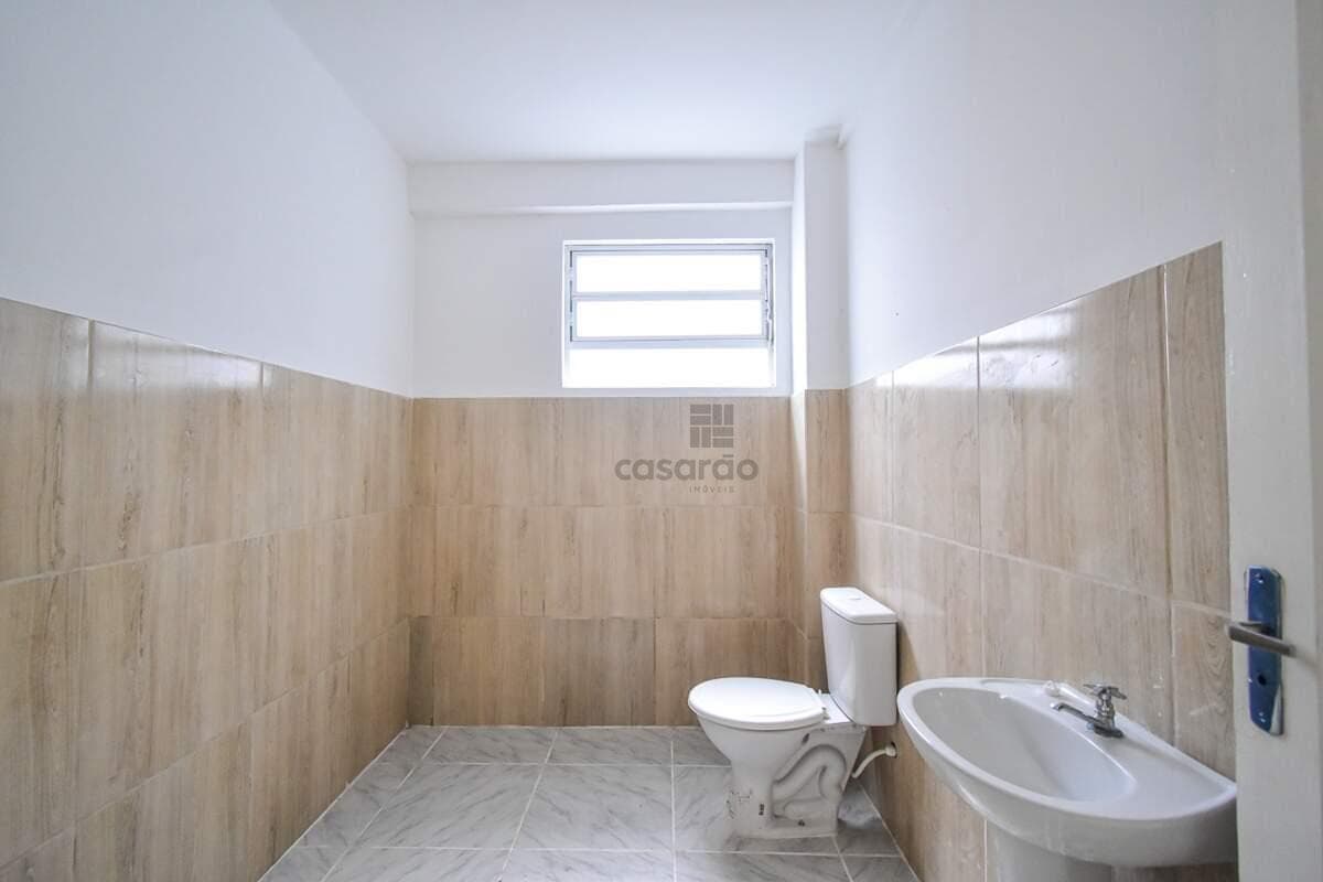 acwf8q-sala-no-centro-banheiro-social.jpg