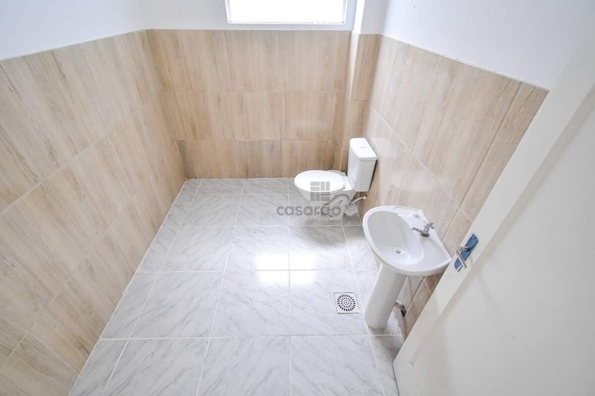 gnzy9-sala-no-centro-banheiro-social.jpg