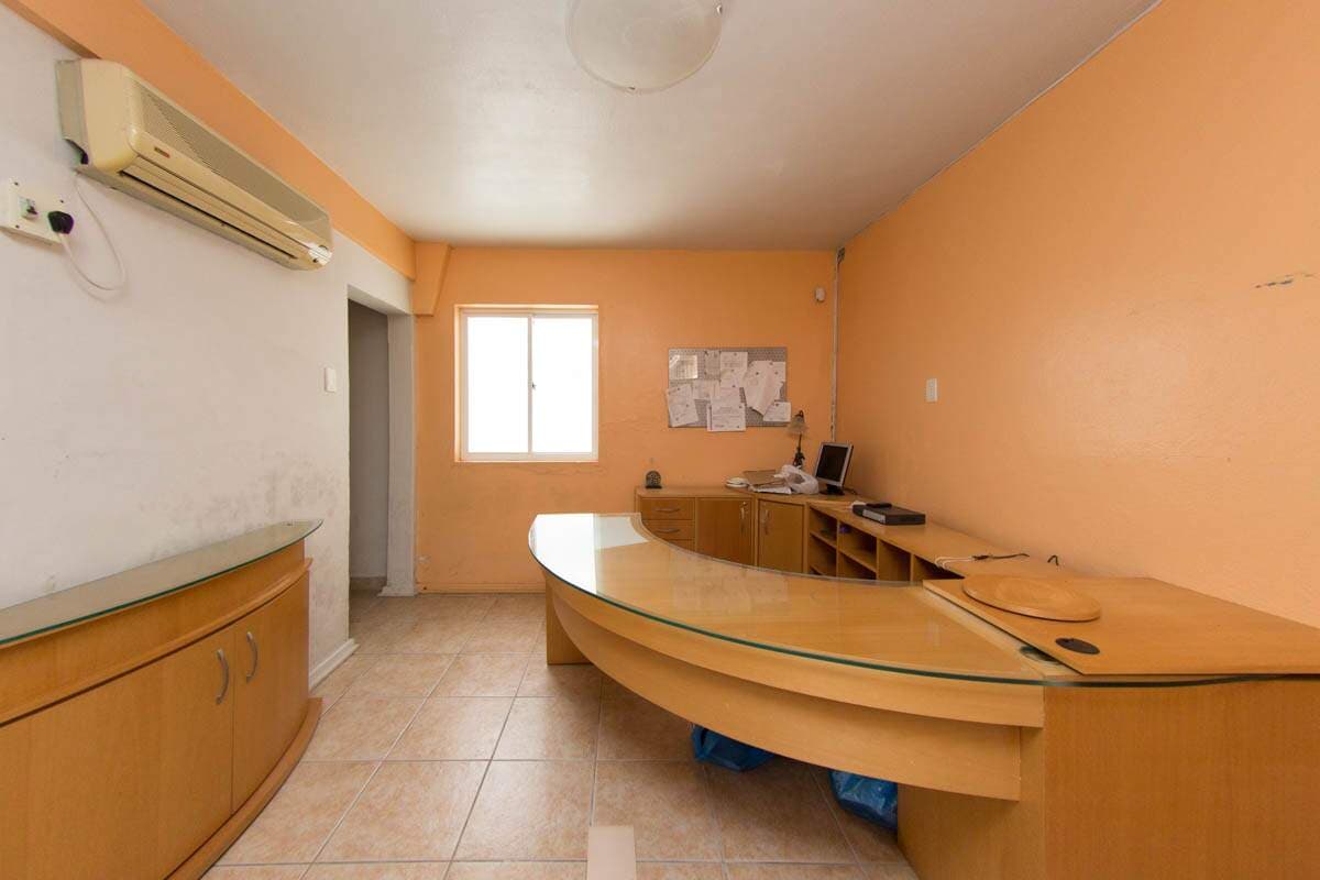 r0e3ul-predio-no-pelotas-sala.jpg