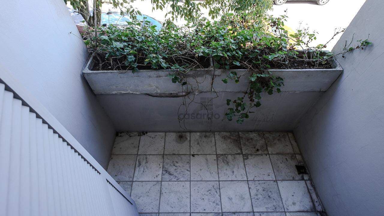 xy160o-casa-comercial-no-pelotas-sacada-1.jpg