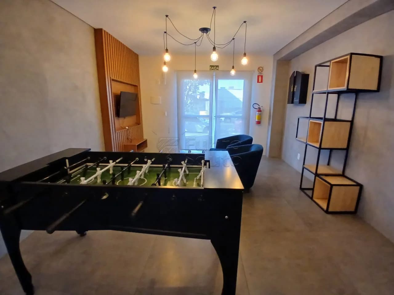 y055e-sala-de-jogos-do-condominio.webp