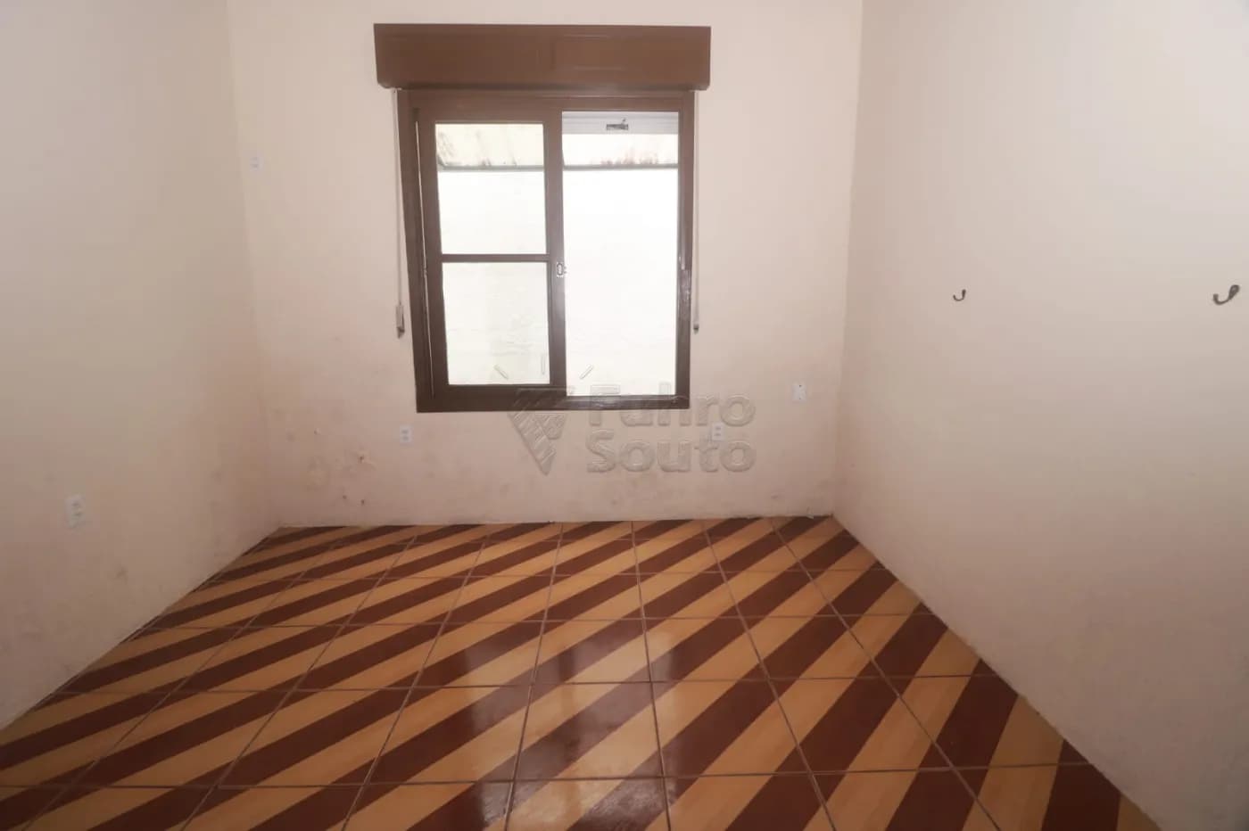 bk1u9j-pelotas-casa-padrao-centro-12-12-2025_15-00-12-693c582cada43.webp